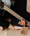 Ultimate Guitar Neck Rest Repair Kit With Premium Basswood Work Mat For Electric And Bass Care Luthier Essentials Easy Portable Travel Setup, shown with a guitar.