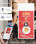 55 Inch FHD Dual Sided LCD Panel With Badass 700 Nit Glow For Window Facing Digital Screens Running Smooth Android And HDMI Ports Top Shelf Commercial Build Slim Frame showing a coffee advertisement in a cafe.