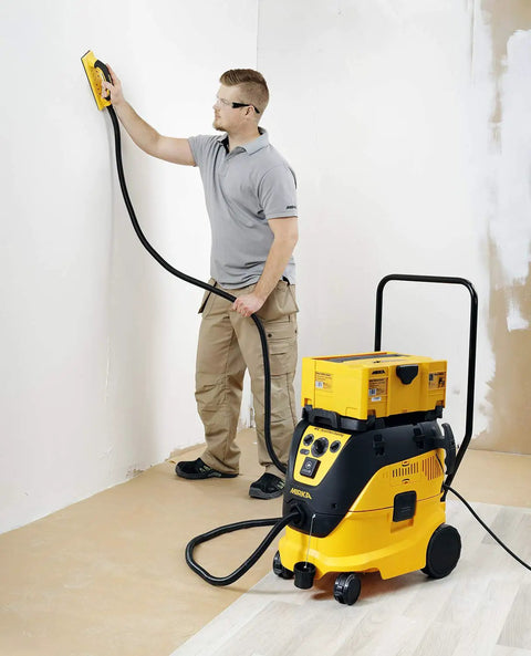 Man using Vacuum Hose For Hand Sanding Blocks 13 Ft Lightweight Flexible Hose With Tapered Plug Fits Multiple Vacuum Ports