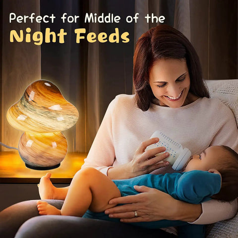 Pacifier Shaped Mushroom Lamp With Stepless Dimmable Glass Bedside Table Lamp next to mother feeding baby