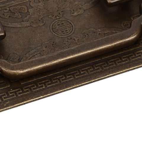 Close-up of Antique Bat Style Brass Drawer Pull Handle With Two Screws for Cabinets, showing the intricate design and texture.