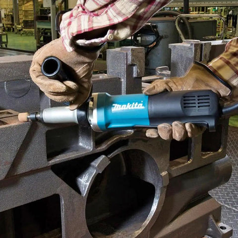 Heavy Duty Quarter Inch Sjs Die Grinder With Six Point Six Amp Motor Pushing Up To Twenty Eight Thousand Rpm Variable Speed Trigger being used on metal.