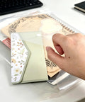 Clear Plastic Envelopes With Snap Closure 100 Pack A4 Size File Folders for storing documents and papers, shown with hand opening.