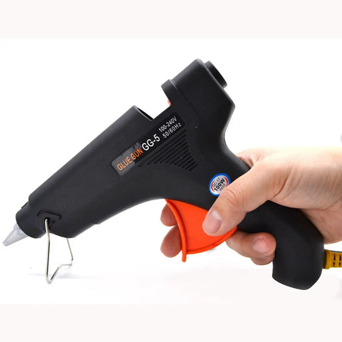 Hand holding Wax Sealing Glue Gun For 0.4 Inch Sticks, Quick Heat And Smokeless Melt, designed for crafts and letters.
