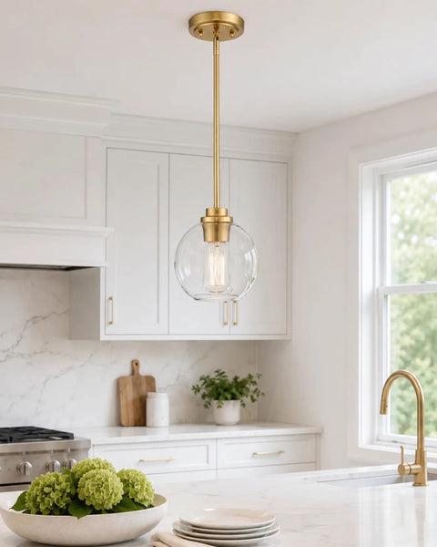 Two Pack Brass Pendant Lights With Clear Glass Globe Shades Farmhouse Gold Hanging Lamps For Kitchen Island Dining Room And Entryway, featuring a clear globe shade above a kitchen counter.