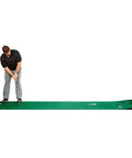 Man using Odyssey 10 Foot Indoor Putting Green Mat For Home Or Office Practice With Realistic Surface And Extended Length