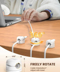 Six Pack 360 Degree Rotatable Cord Organizer Clips With One Second Lock Spring Cord Holder securing cables on a desk