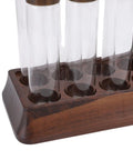 Slay Your Kitchen Game With This Top Shelf Airtight Coffee Bean Cellar Featuring Durable Walnut Wood And Sleek Glass Tubes To Lock In Peak Freshness For Serious Baristas; close-up view of walnut wood base with glass tubes.