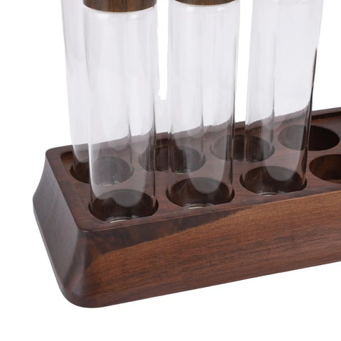 Keep Your Daily Coffee Run Fresh With This Top Tier Airtight Single Dose Bean Cellar Crafted From Genuine Walnut Wood And Clear Glass Tubes Designed To Be Hella Dope On Any Modern Counter While Blocking Out That Stale Funky Taste, showcasing clear glass tubes in walnut base.