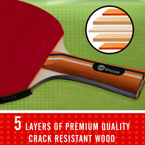 Close-up of a paddle from the Four Paddle Ping Pong Set With Carry Case And Eight Balls showing 5 layers of crack-resistant wood.