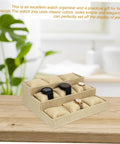 Multi Grid Watch Organizer With Deep Compartments For Desktop And Home, Classic Jewelry Display Tray With Soft Cushion Pads on wooden surface.