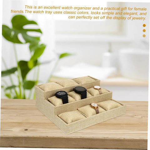 Multi Grid Watch Organizer With Deep Compartments For Desktop And Home, Classic Jewelry Display Tray With Soft Cushion Pads on wooden surface.