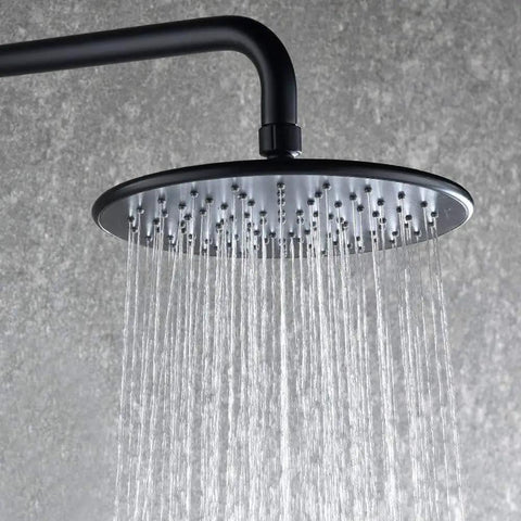 CUTPOIY Shower Set, Wall Bathroom Shower Mixers, Black Golden Brass Rainfall Concealed Shower System Embedded Box Mixer Valve, 10 Inch-A stainless steel rainfall shower head with water flowing.