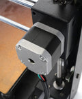 Side view of a NEMA 17 stepper motor extruder mounted on a 3D printer frame with visible wiring.