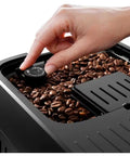 Hella Smooth Automatic Bean To Cup Coffee Maker Featuring One Touch Auto Milk Frother And 13 Custom Grind Settings close-up of grind settings knob with coffee beans