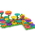 101 Piece Gear Building Set For Kids So They Can Build Twisting Gardens While Learning Cause Effect Sequencing And Early Engineering Hands On STEM Construction Toy Montessori Inspired Kid Friendly Fine Motor Play And Educational Engineering Gift showing colorful interlocking gears and bases forming a garden-like structure.