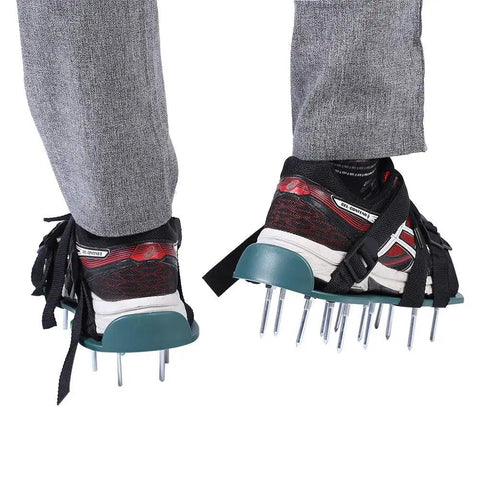 Pre Assembled Lawn Aerator Shoes With Spiked Metal Grips, Adjustable Straps, shown on feet, heavy duty boots for soil aeration