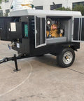 Heavy Duty Rotary Screw Air Compressor With 100L Or 500L Tank And Integrated Air Dryer for factory use on trailer in outdoor setting.
