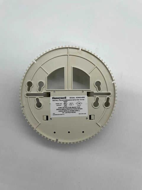 Top Tier Addressable Sensor Relay Base Featuring No Hassle Mounting And Slick Build Quality For Effortless Signal Transfer In Commercial Fire And Security Deployments, shown from the bottom view.