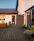 64 Inch Outdoor Solar Lamp Post With Planter 60 Lumen Waterproof Garden Path Driveway Light for Yard set on a wooden deck