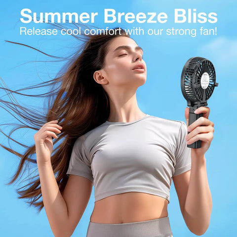 Woman enjoying Portable Handheld Fan With USB Rechargeable Battery On The Go 180 Degree Foldable Quiet for Travel Home use