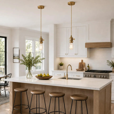 Slick Polished Brass Pendant Light Cord Kit With Heavy Duty Braided Textile Wire And Secure E26 Lamp Base over kitchen island.