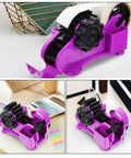 Heavy Duty Semi Automatic Packing Tape Dispenser Smooth Operator Design With Nifty Dual Cutting Station, purple color, on desk with papers.