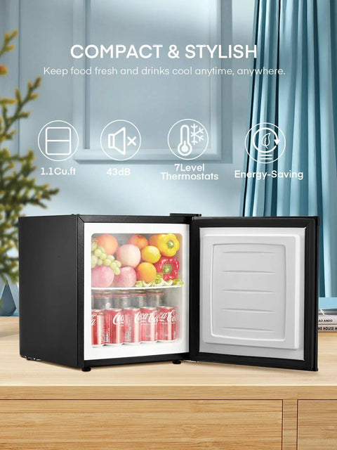 One Point One Cubic Foot Compact Countertop Mini Freezer Built For Tiny Dorm Kitchens Home Offices And Campers Hella Easy Plug And Play Real Deal Frozen Food Storage with open door showcasing fruits and drinks.
