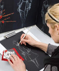 Artist drawing with Three Pack White Charcoal Pencil Set For Drawing Sketching Shading Blending And Highlights On Dark Paper Top Notch Pro Grade Quality For High Contrast Artwork And Easy Light Accents on dark paper