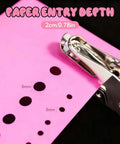 Two Piece Hole Punch Set Circle Punches One Quarter Inch And One Eighth Inch with pink paper and punch holes visible