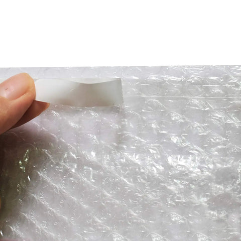 Close-up of self-sealing bubble out bags 8x12 inch showing premium seal and bubble cushioning for moving and storage.
