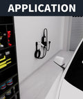 Built Tough EV Charger Holder Wall Mount Kit With J1772 Cable Dock mounted on wall beside tools in garage setting.