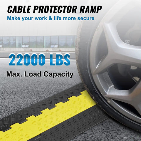 Beefed Up Heavy Duty 5 Pack TPU Cable Protector Ramp With 2 Channel Design for driveways shown with tire on ramp