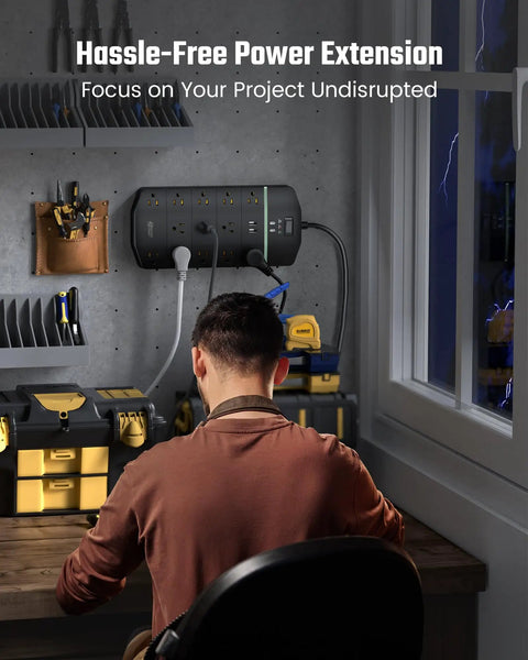 Person using Beefed Up Heavy Duty Power Strip With 13 Widely Spaced Outlets on workbench in home office