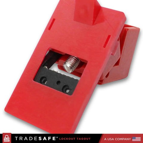 Close-up of red clamp on circuit breaker lockout device, OSHA compliant, for 120/277 Volt, single pole toggles up to 5/8 by 1/2 inch.