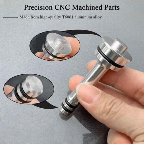 Close-up of Thermostat Bypass Kit For 6L80 6L90 And 8L90 Transmissions With CNC Machined Parts And O Rings in hand