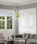 Straight Up 16 Light Satin Brass Foyer Pendant Chandelier With Real Clear Crystal Rods Built Different For Grand Entries And Modern Homes Damp Rated, in a stylish living room setting.
