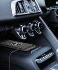 Rugged Wireless Car Charging Pad For Chevy Blazer EV 2024 To 2026 on dashboard with non-slip silicone grip and cable.