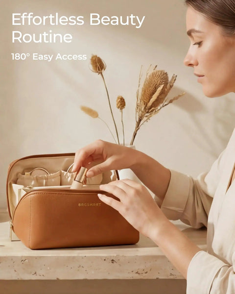 Woman organizing Go To Large Makeup Bag Travel Cosmetic Organizer In PU Leather Flat Open Toiletry Case For Women, classic brown finish.