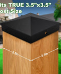 Rock Solid 4x4 Aluminum Post Caps Matte Black Pyramid Fence Covers on 3.5x3.5 inch wooden post, showcasing tight fit and durable design.