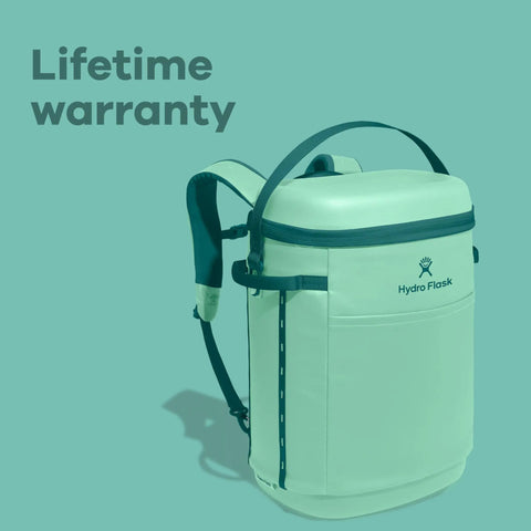Carryout Cooler Backpack With All Day Cold Insulation And Portable Soft Build Trail And Park Friendly Features An Ergonomic Strap System 22 Liter Capacity In Shale Gray side view on teal background.
