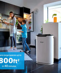 Family using AirMax 8L 3-In-1 Blue Ultra Filter Higher Grade H13 True HEPA Filtration System in kitchen, ideal for home use.
