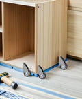 Fixed Caster Wheels Inch 6pcs Rubber for Furniture and Carts installed on wooden furniture with gray and blue accents.