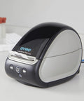 Turbo Driven Direct Thermal Label Printer With Automatic Size Detection And Plug And Play Usb Hookup Plus Lan Networking for shipping, compact design.