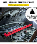 Beefy Heavy Duty Engine Support Bar 1100 Lbs Capacity For Transmissions And Engine Removal With 2 Point Lift Dual Hooks Stable Hoist For Home Garages And Auto Repair Shops. red steel engine support bar in car bay, 1100 lb capacity