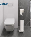 Brushed Nickel Free Standing Toilet Paper Holder Stand with space for one in use roll and three spare rolls in a modern bathroom.