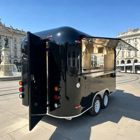 Slick 12 Foot Black Stainless Steel Commercial Food Trailer Equipped With Turnkey Mobile Beer Bar Station And Tough Catering Gear For A No Fuss Pop Up Hustle exterior view with open serving window.