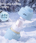 Mama Approved Portable Breast Milk Cooler With Two Bpa Free Feeding Bottles Keeps Little Ones Chilled On The Go No Sweat Travel Kit For Modern Working Parents in snow with visible cooling bottle.