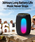 Portable Bluetooth Speaker With Loud Stereo Sound And Beastly Bass, 8 LED Light Modes, 36 Hours Playtime on outdoor table