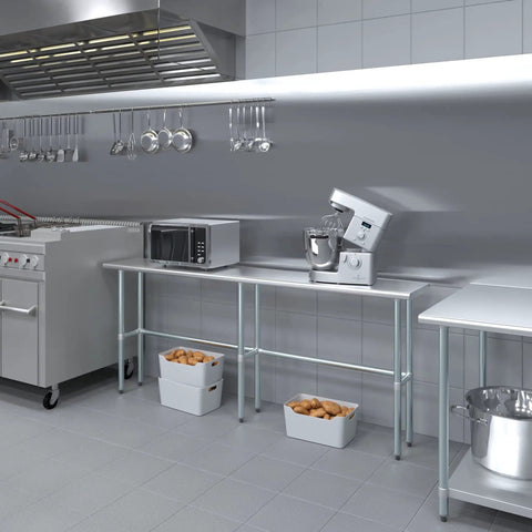 Rock Solid Heavy Duty Stainless Steel Work Table With Open Base Commercial Grade Metal Prep Bench For Restaurants Garages And Workshop Areas 84 Inch Long By 14 Inch Deep in a modern kitchen setup.